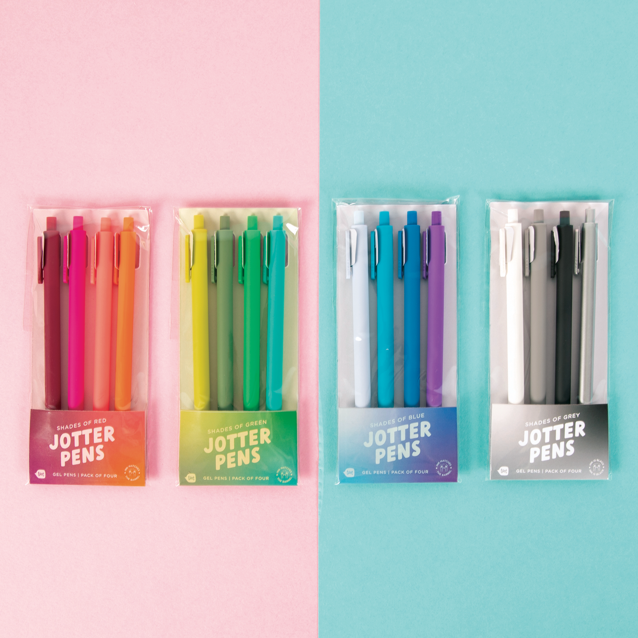 Four packages of Jotter Pens on a pink and blue background